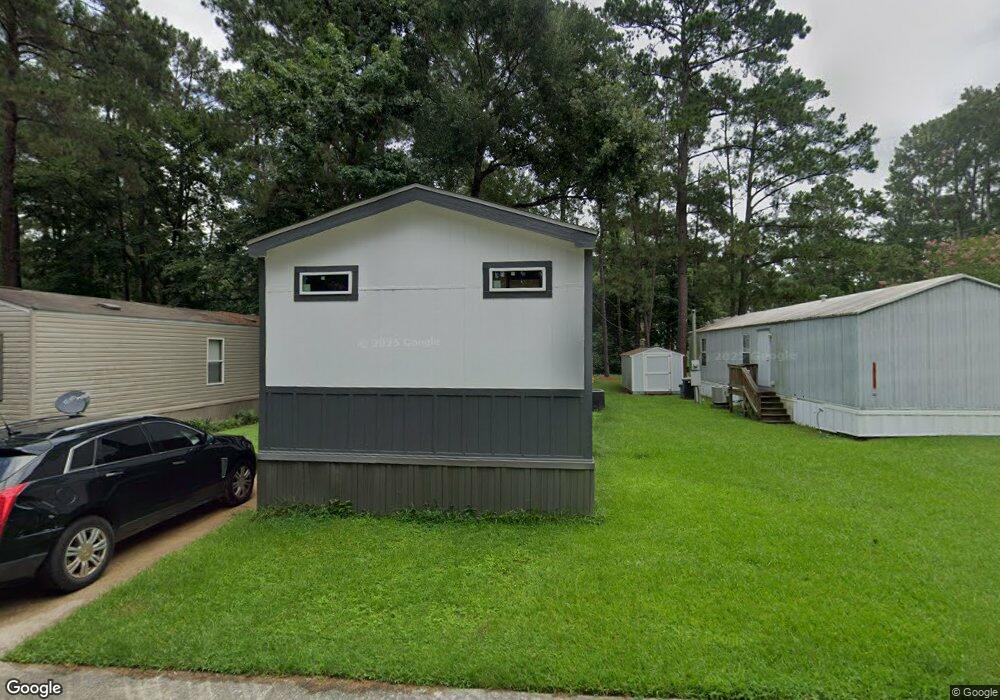 33022 Ash St unit 60, Pinehurst, TX 77362 - photo 1