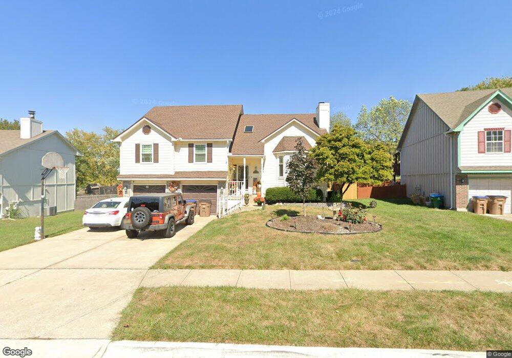 308 W Calico Dr, Raymore, MO 64083 - photo 1