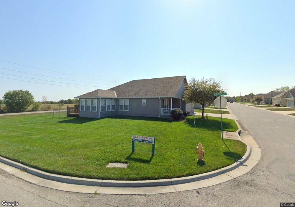 511 Neptune Dr, Raymore, MO 64083 - photo 1