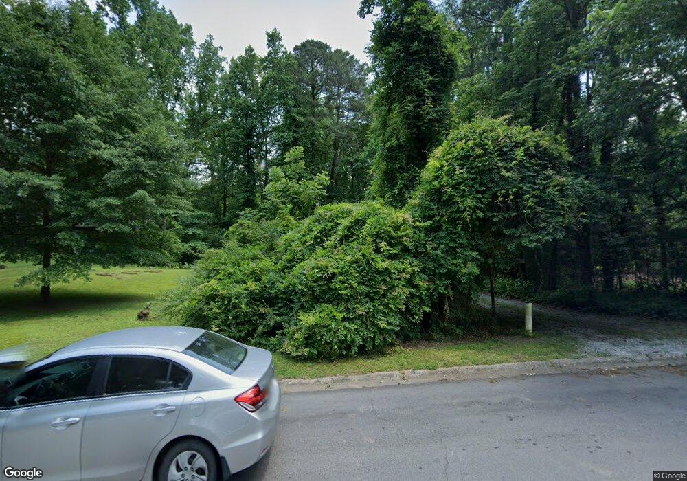 4122 Whispering Forest Ct SW, Lilburn, GA 30047 - photo 1