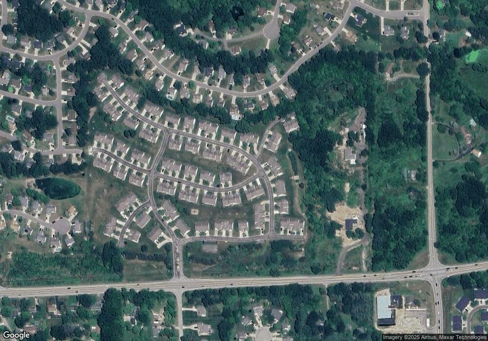 2604 Kerria Dr unit 124, Howell, MI 48855 - photo 1