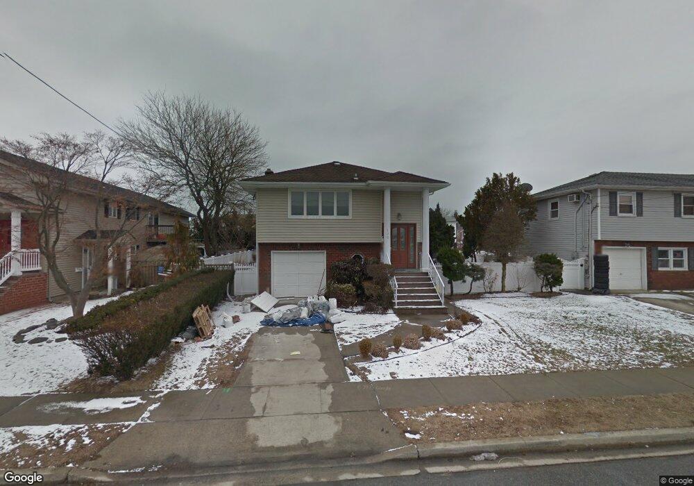 130 Sunset Ave, Island Park, NY 11558 - photo 1