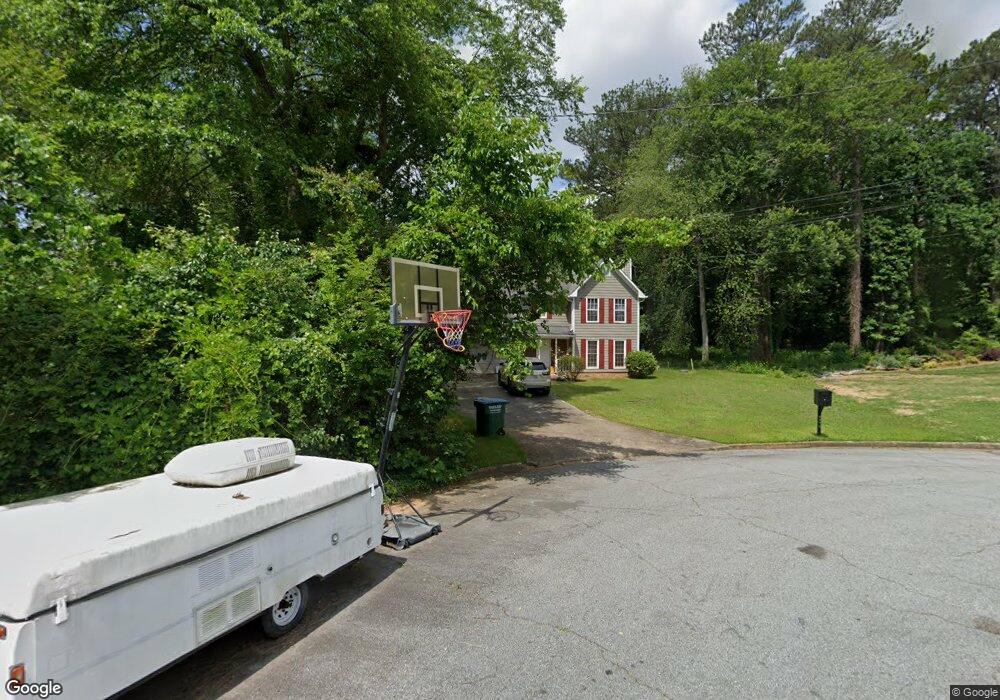 4372 Deer Ridge Ct SW, Lilburn, GA 30047 - photo 1