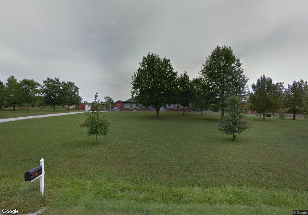 1209 E Meadow Brook Dr, Raymore, MO 64083 - photo 1