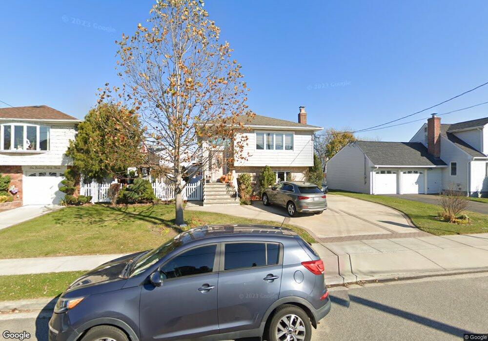 137 Traymore Blvd, Island Park, NY 11558 - photo 1