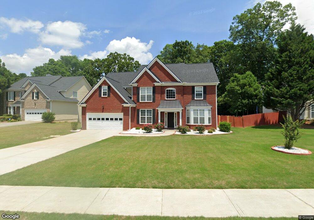 1880 Embassy Walk Ln, Lilburn, GA 30047 - photo 1