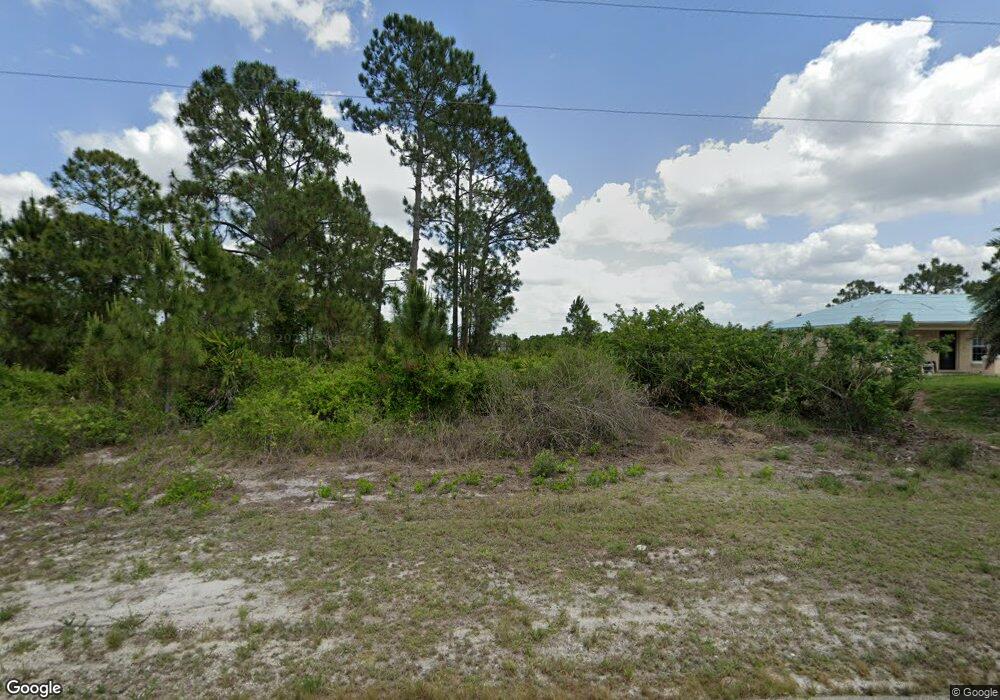 709 Peacock Ave, Lehigh Acres, FL 33974 - photo 1