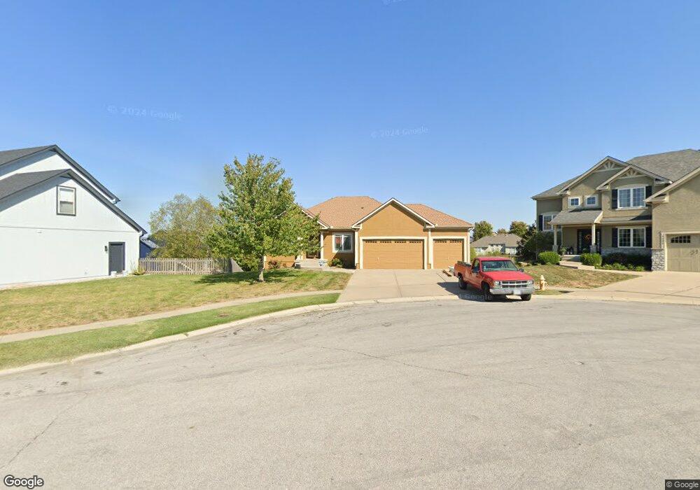 1232 Edwards Cir, Raymore, MO 64083 - photo 1