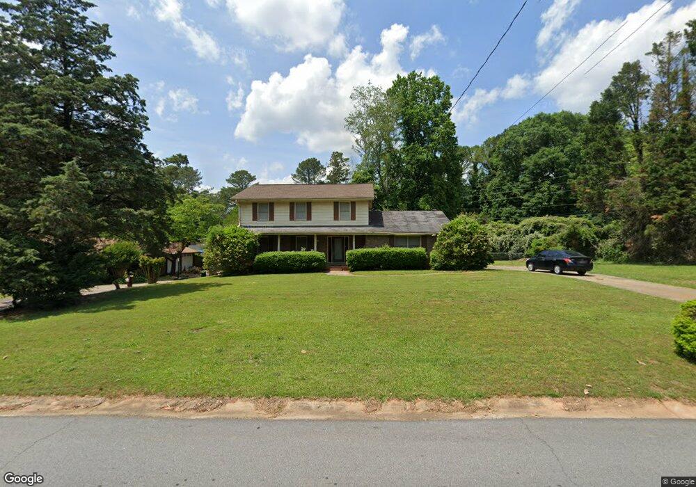 4011 Whispering Forest Ct SW, Lilburn, GA 30047 - photo 1