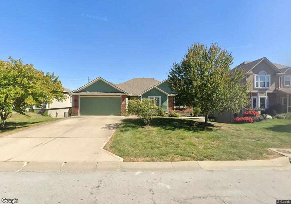 911 Trailway Dr, Raymore, MO 64083 - photo 1