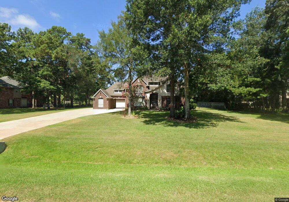 10411 Clubhouse Cir, Magnolia, TX 77354 - photo 1