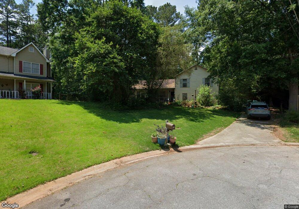 1851 Whispering Willow Way SW, Lilburn, GA 30047 - photo 1