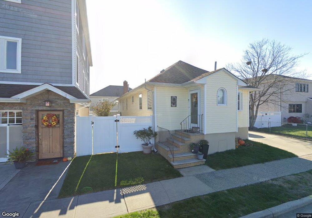 9 Deal Rd, Island Park, NY 11558 - photo 1