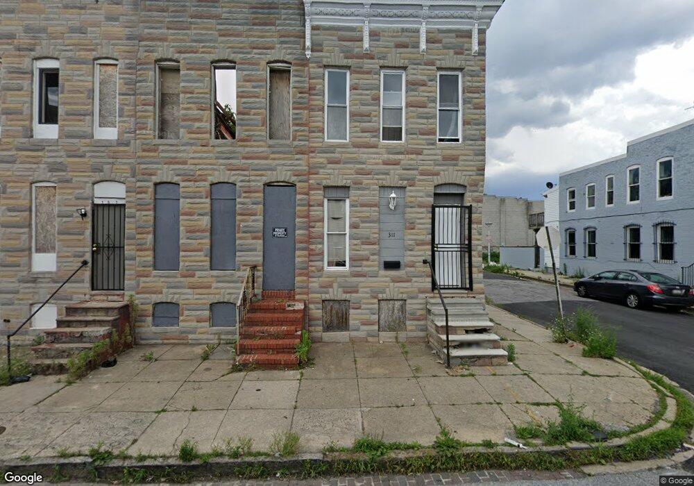 309 S Pulaski St, Baltimore, MD 21223 - photo 1