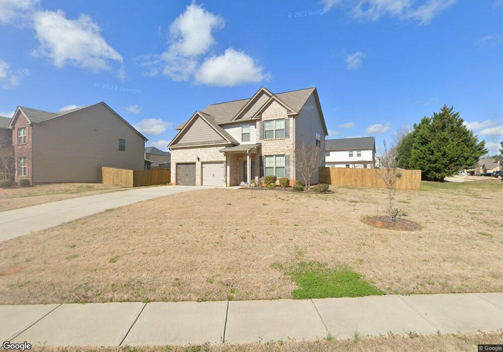 980 Celebration Ct unit 115, Locust Grove, GA 30248 - photo 1