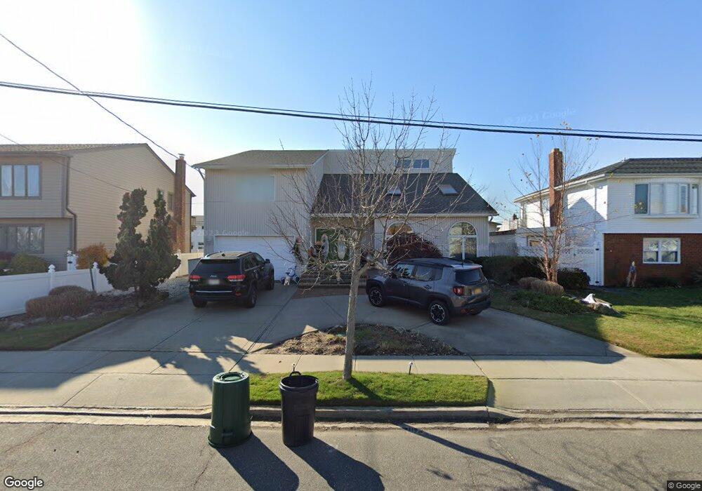 230 Pennsylvania Ave, Island Park, NY 11558 - photo 1