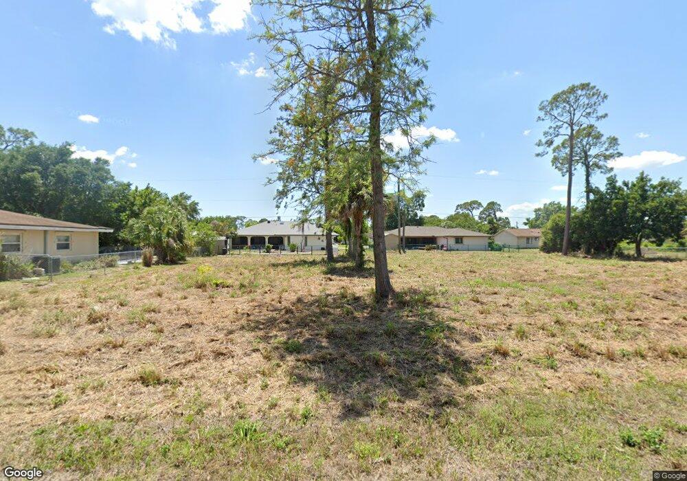 1245 Pike Ave NW, Port Charlotte, FL 33948 - photo 1