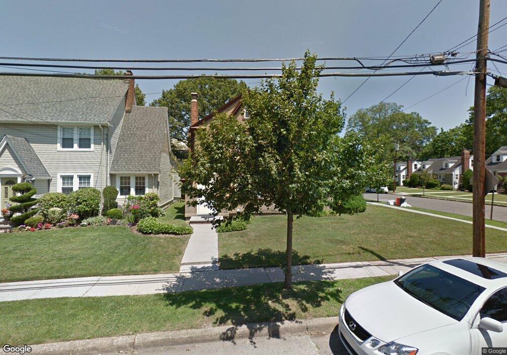 84 Woodnut Place, Mineola, NY 11501 - photo 1