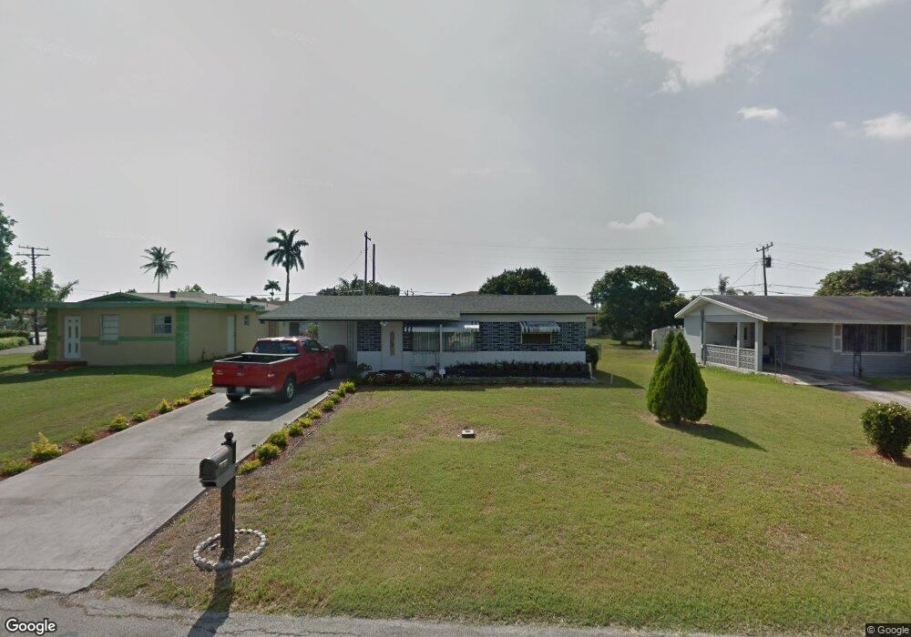 605 SW 11th St, Belle Glade, FL 33430 - photo 1