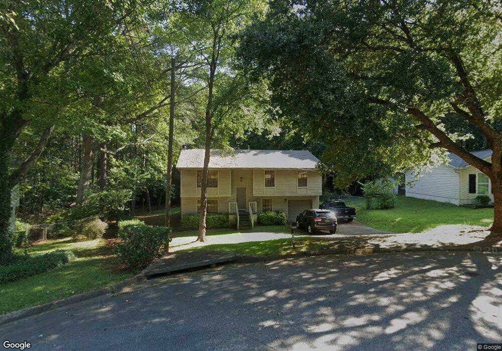 1064 Chisolm Way NW, Lilburn, GA 30047 - photo 1