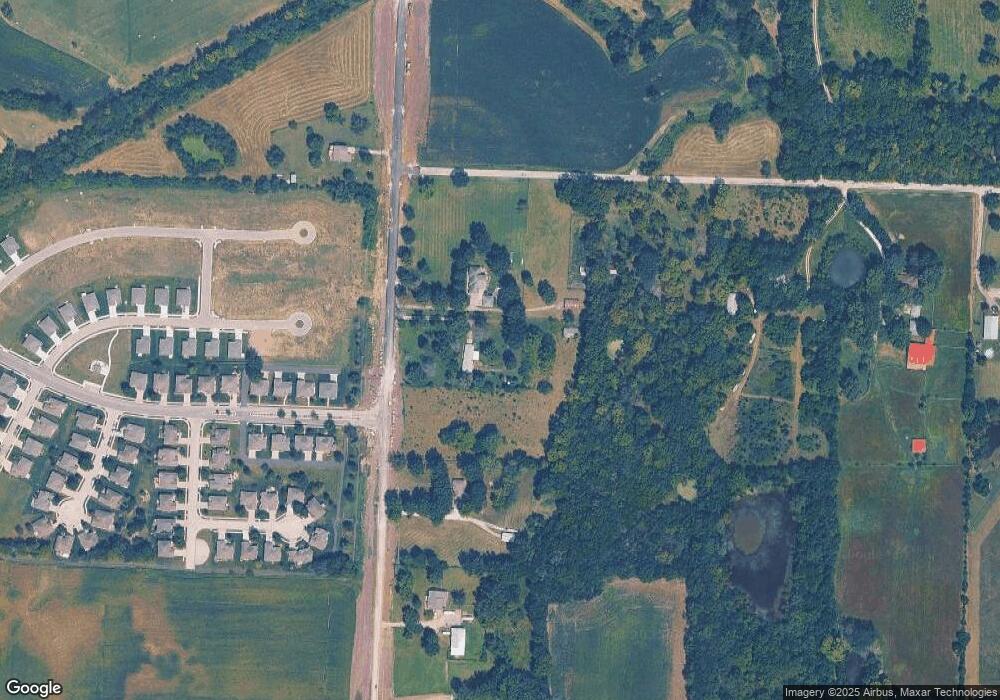 311 N Ward Rd, Raymore, MO 64083 - photo 1