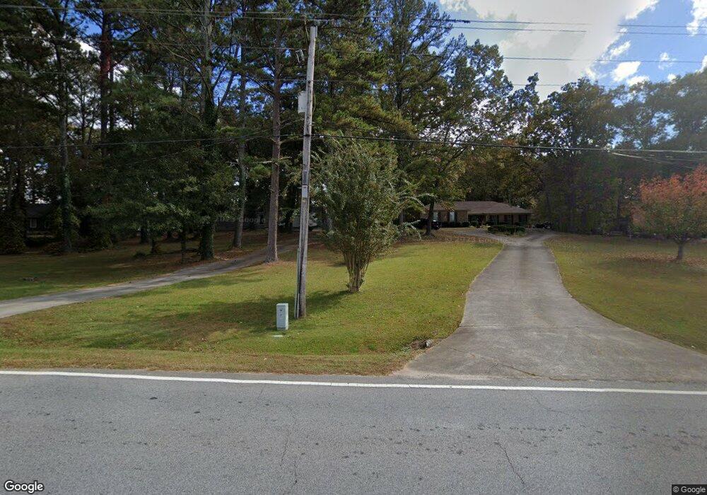 1402 Hewatt Rd SW, Lilburn, GA 30047 - photo 1