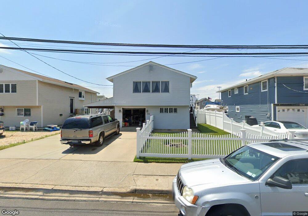 310 Arthur St, Freeport, NY 11520 - photo 1