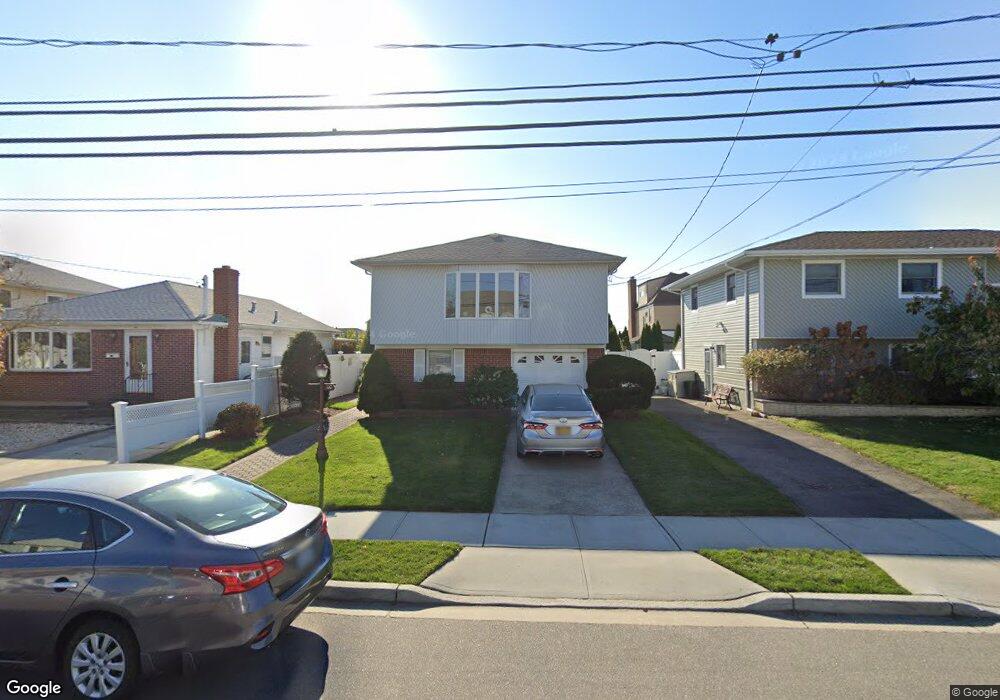 144 Hamilton Ave, Island Park, NY 11558 - photo 1