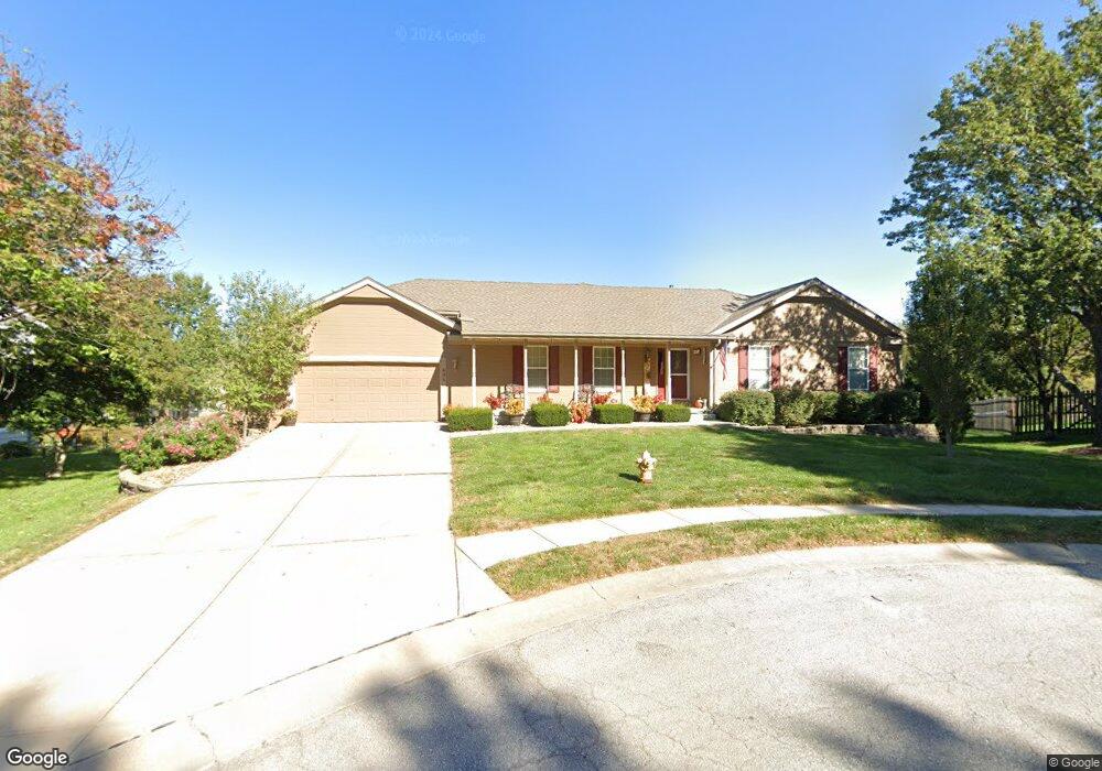 606 Rosewood Cir, Raymore, MO 64083 - photo 1