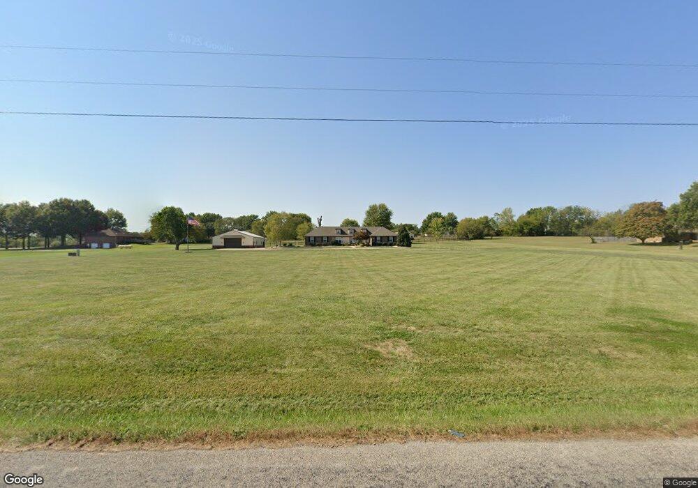 1014 S Prairie Ln, Raymore, MO 64083 - photo 1