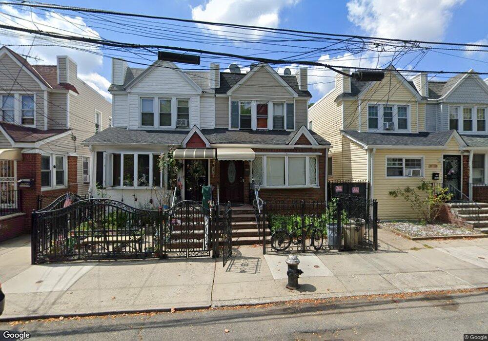 9738 82nd St, Ozone Park, NY 11416 - photo 1