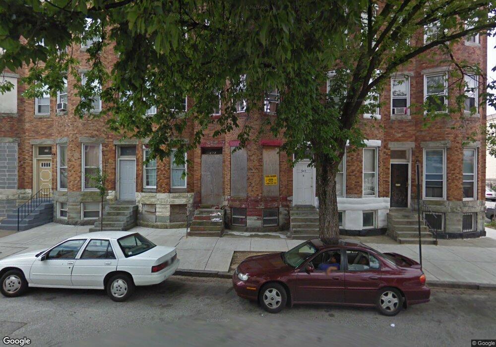 305 E 22nd St, Baltimore, MD 21218 - photo 1