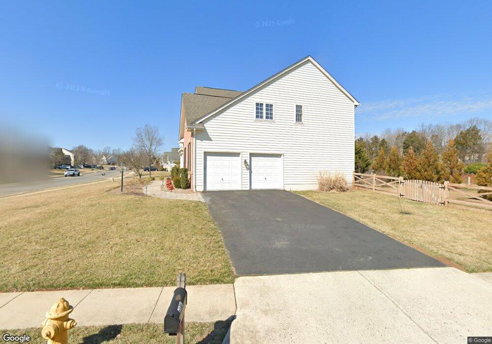 9104 Roaring Spring Loop, Bristow, VA 20136 - photo 1