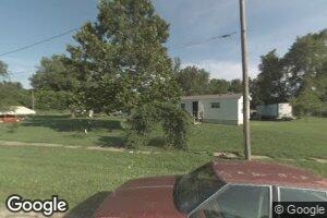 206 E 3rd St, Henrietta, MO 64036