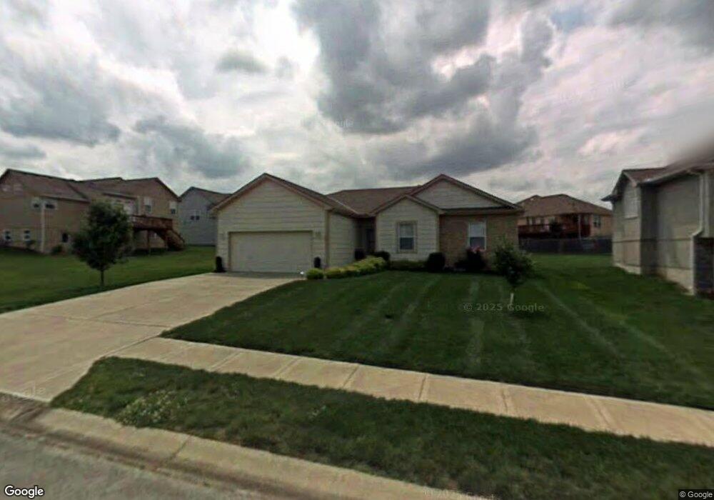 708 Thunder Gulch Dr, Raymore, MO 64083 - photo 1