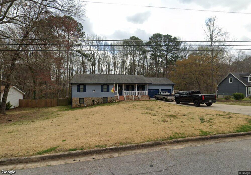 9428 Hidden Hollow Trail, Jonesboro, GA 30236 - photo 1