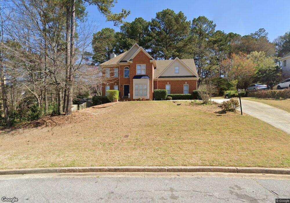 1310 Pond Springs Trace SW, Lilburn, GA 30047 - photo 1