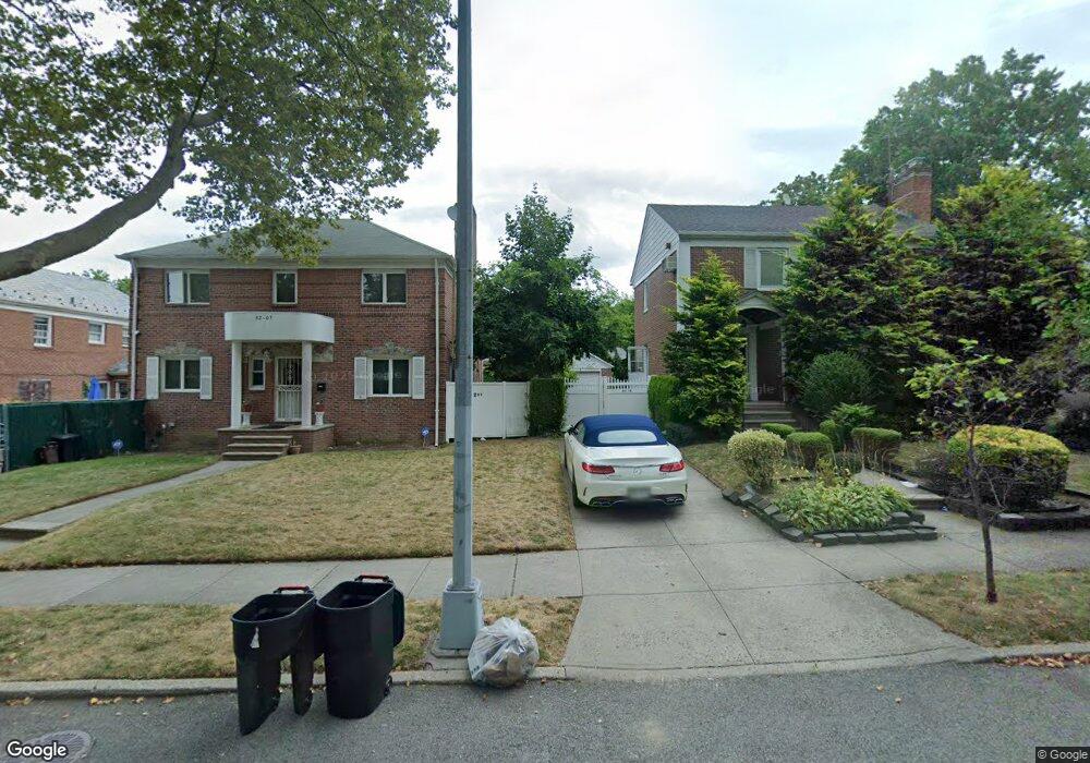 8215 192nd St, Hollis, NY 11423 - photo 1