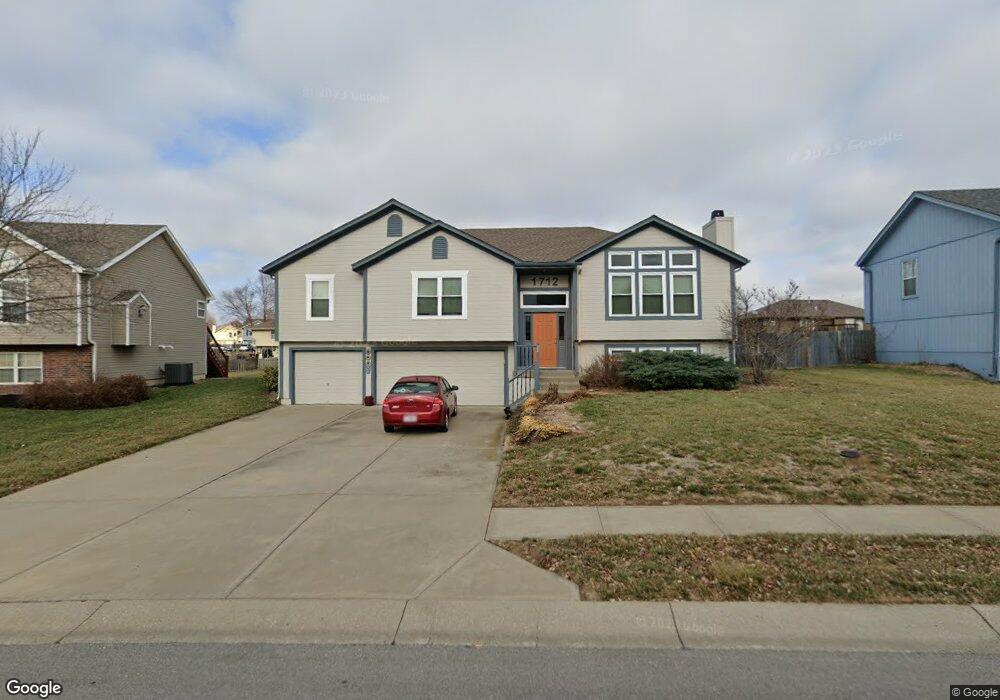 1712 Rolling Rock Rd, Raymore, MO 64083 - photo 1