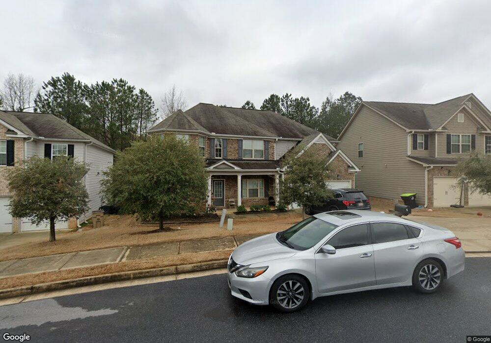 3883 Village Crossing Ln unit 142, Ellenwood, GA 30294 - photo 1