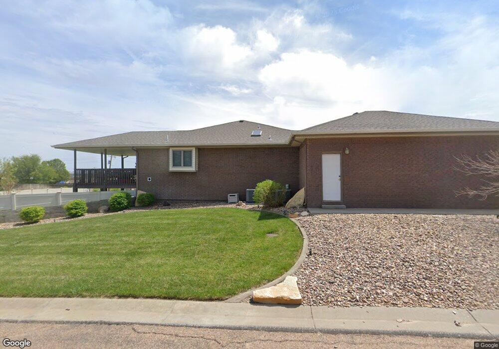 404 Jayhawk Ct, Hugoton, KS 67951 - photo 1