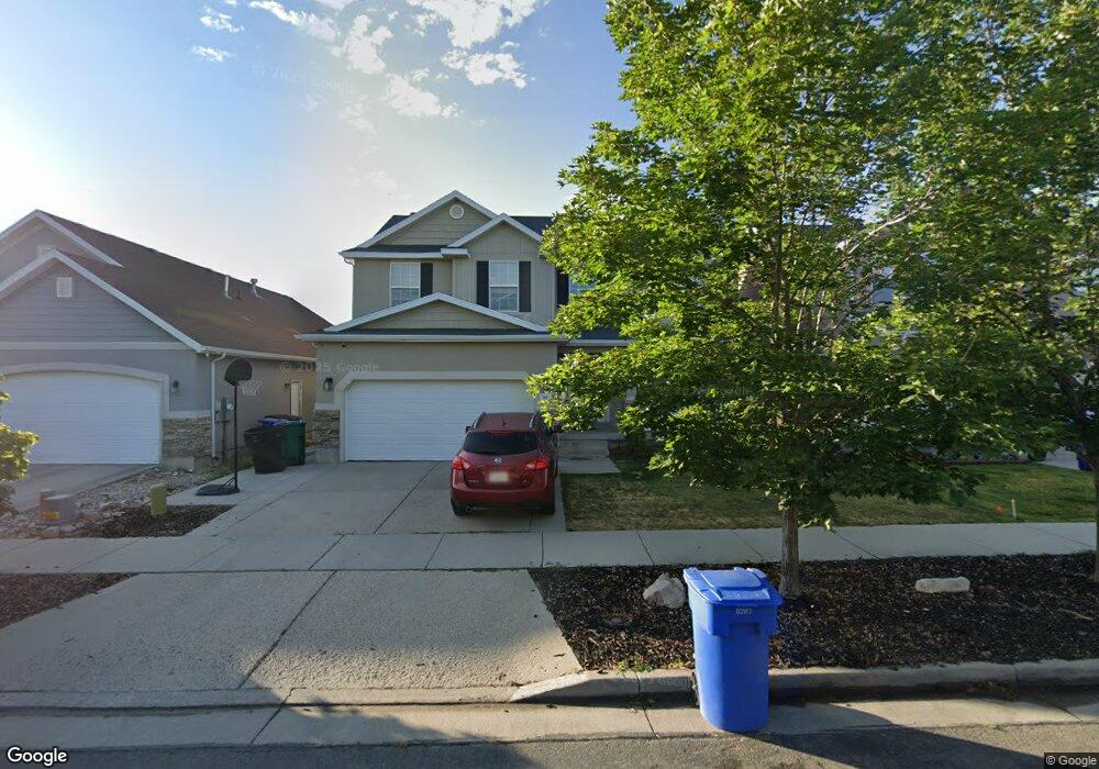 7451 S Sunset Maple Dr, West Jordan, UT 84081 - photo 1