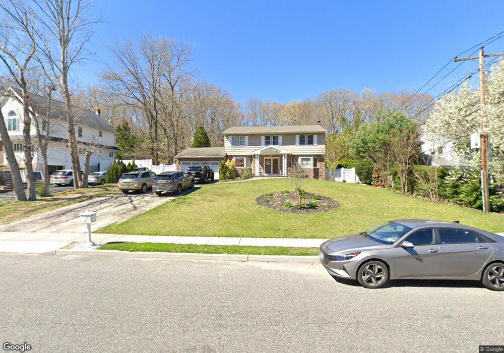 143 Washington Blvd, ComMacK, NY 11725 - photo 1