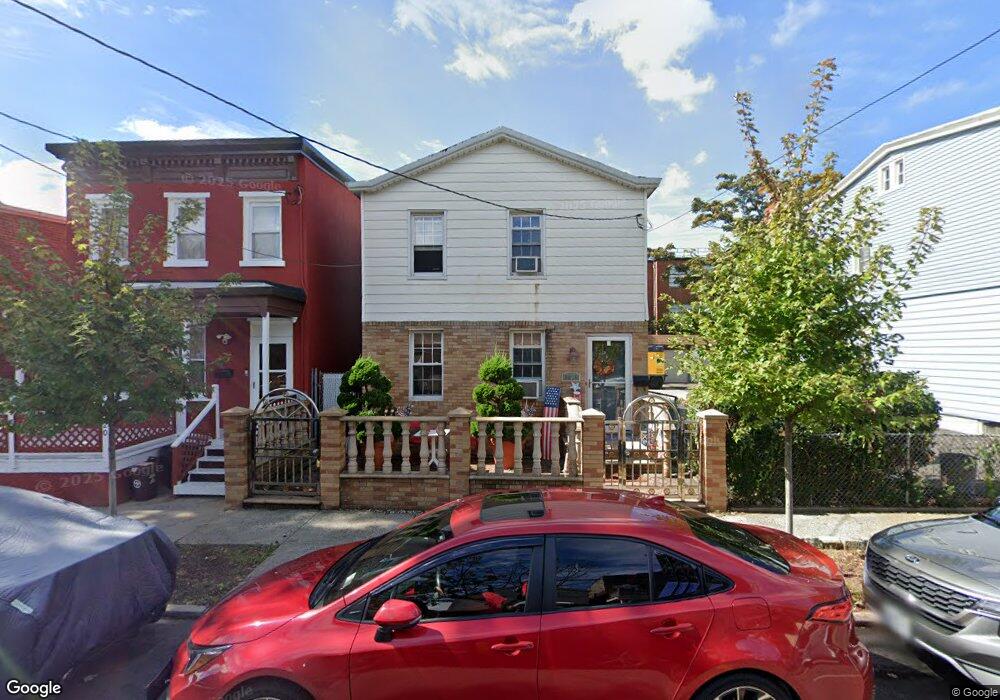 9418 86th St, Ozone Park, NY 11416 - photo 1