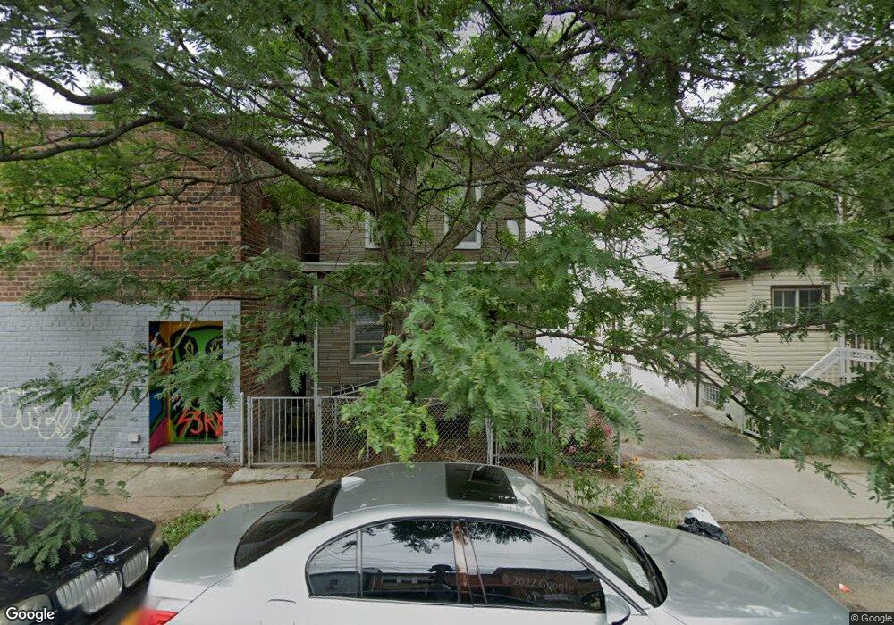 9527 Culloden Place, Ozone Park, NY 11416 - photo 1