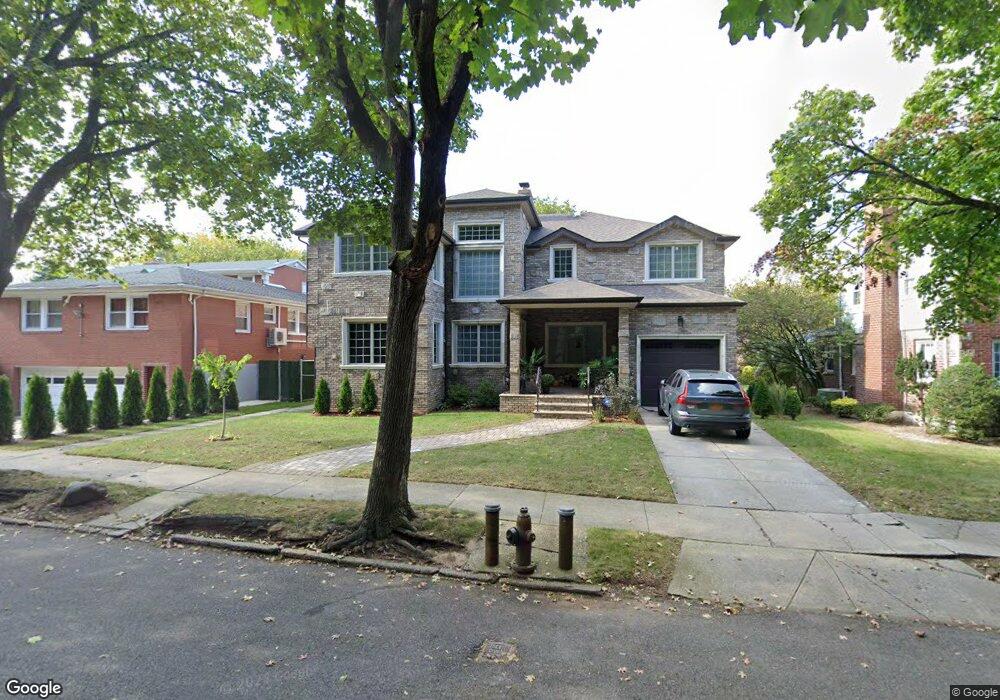 18875 Avon Rd, Hollis, NY 11423 - photo 1