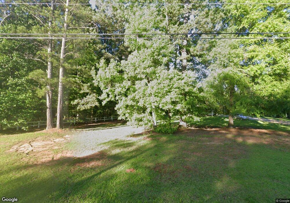 911 Minix Rd, Sharpsburg, GA 30277 - photo 1