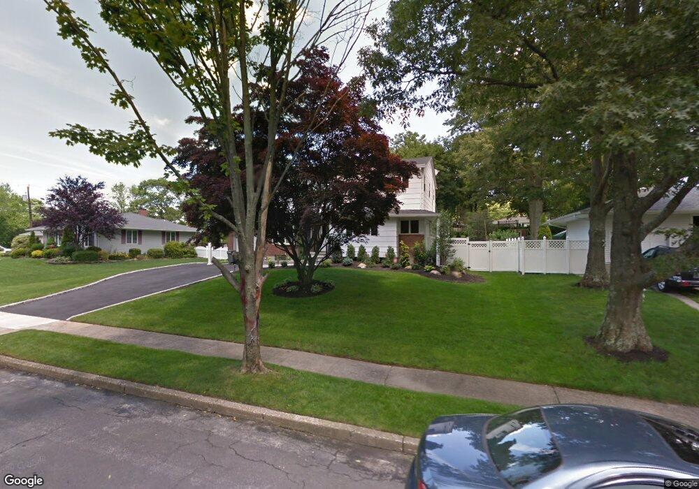 61 Fisher Rd, ComMacK, NY 11725 - photo 1