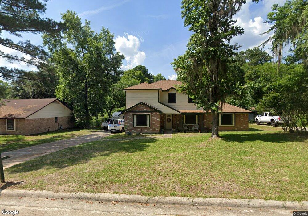 10083 Woodhollow Dr, Conroe, TX 77385 - photo 1