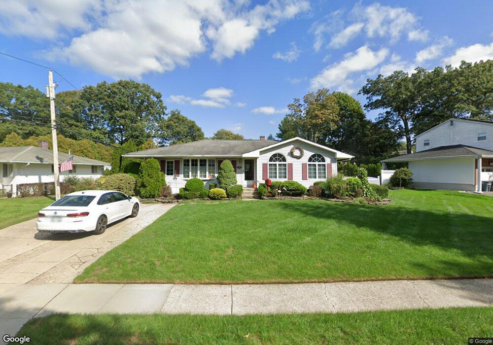 59 Fisher Rd, ComMacK, NY 11725 - photo 1